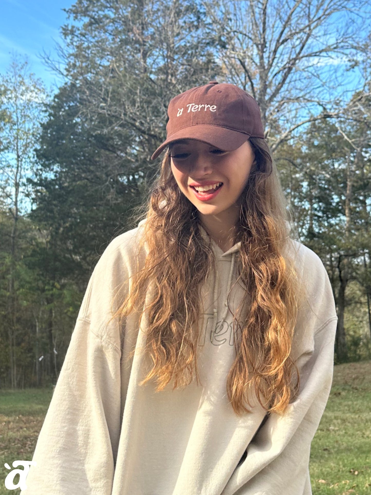a Terre Merch Baseball Hat - Brown/Pink