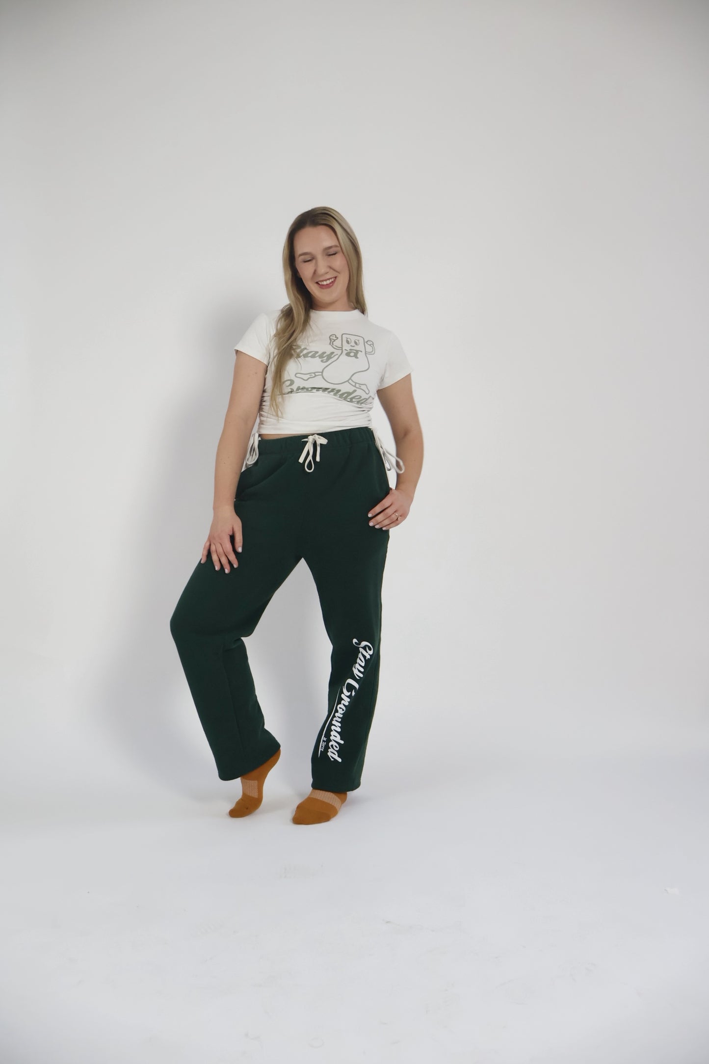 Stay Grounded baby tee by à Terre
